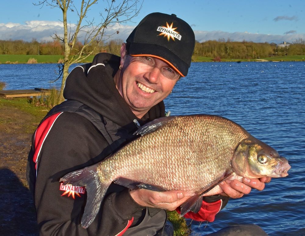 Bream fish species: being carried by a man